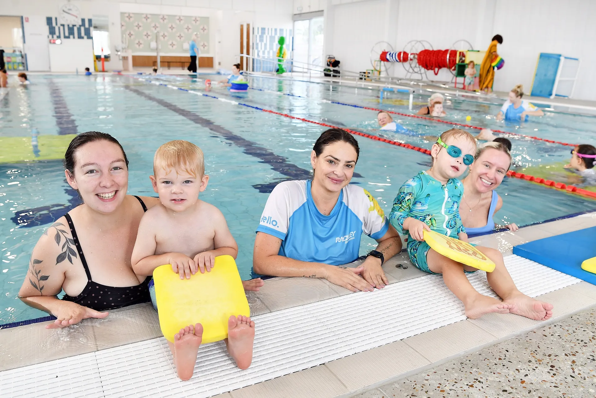 (Left to right) Rachel Turnbull with her son Jacob, Rackley Swimming Instructor Latoya Rodriguez, and Paxton Ciseau with mum Melissa