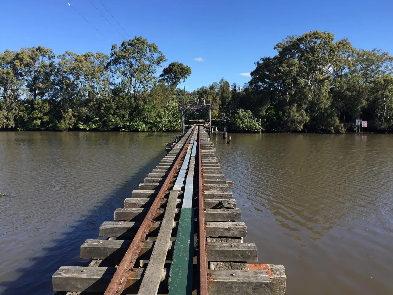 Old timber bridge with tracks over the Maroochy River