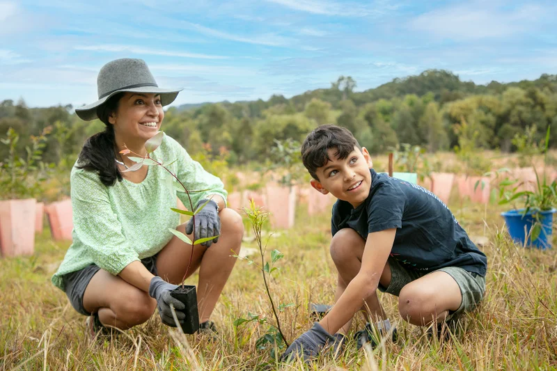 National-Tree-Day-2021-mother-and-son-planting.jpg