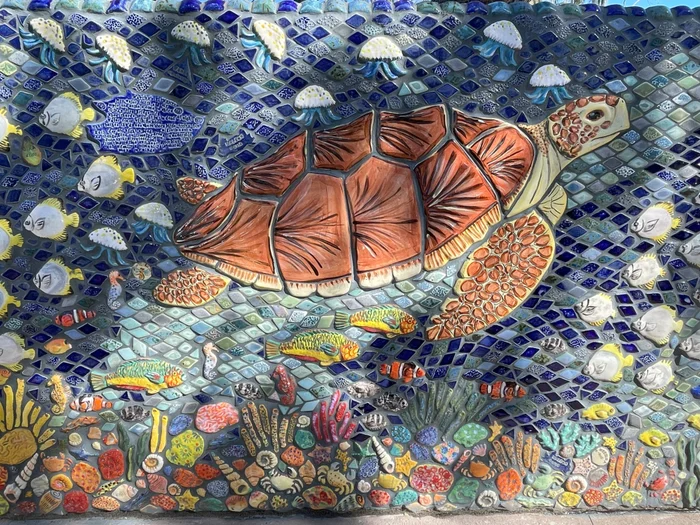 Mosaic tile of a turtle. 