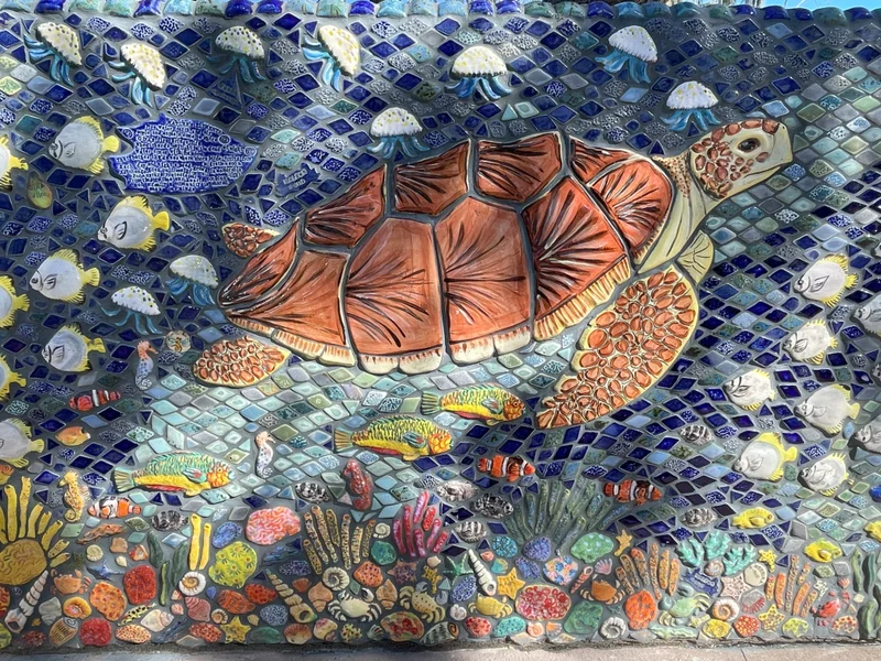 Mosaic tile of a turtle.