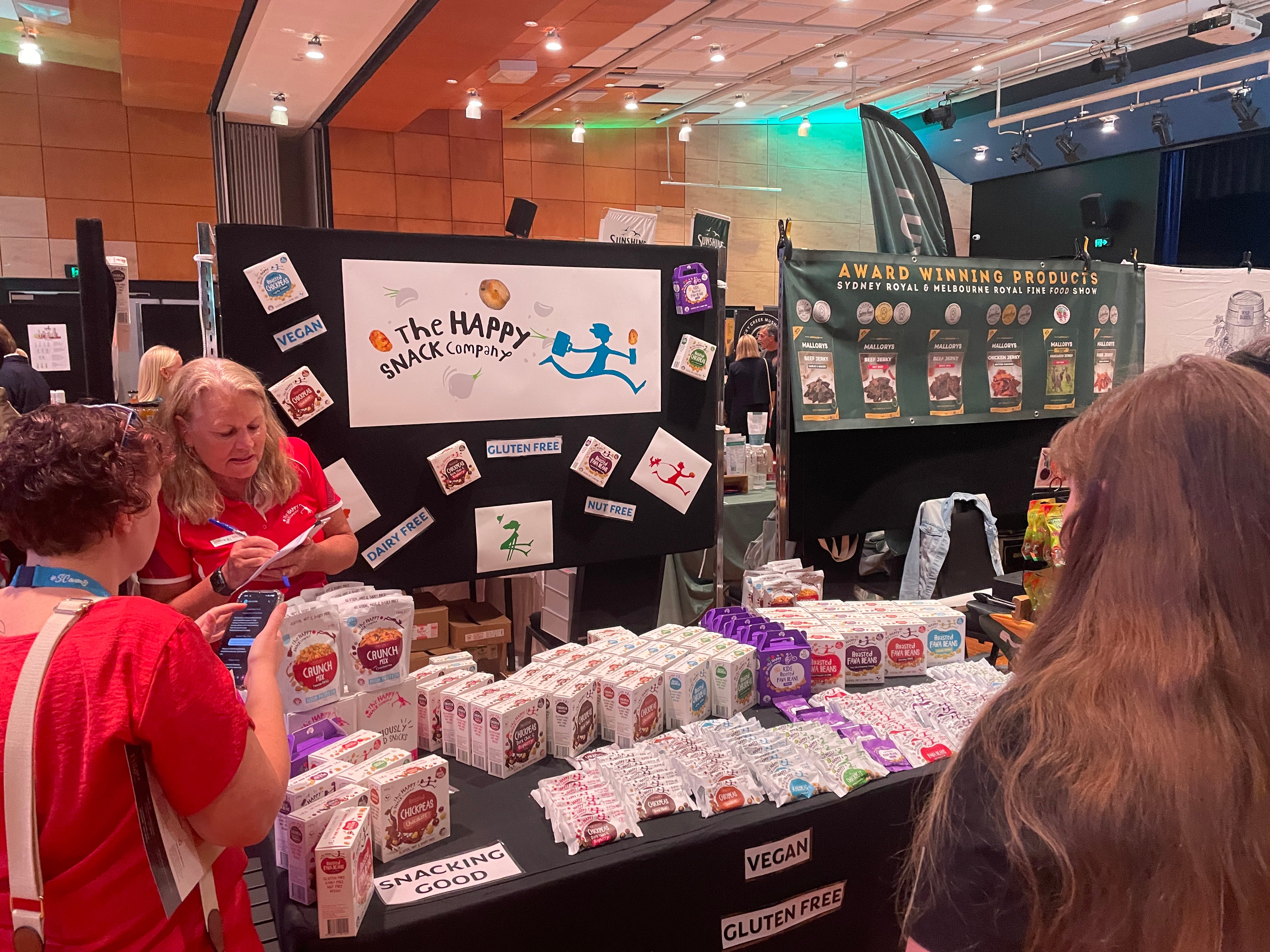 Meet the Makers: The Happy Snack Company representatives talking to potential buyers