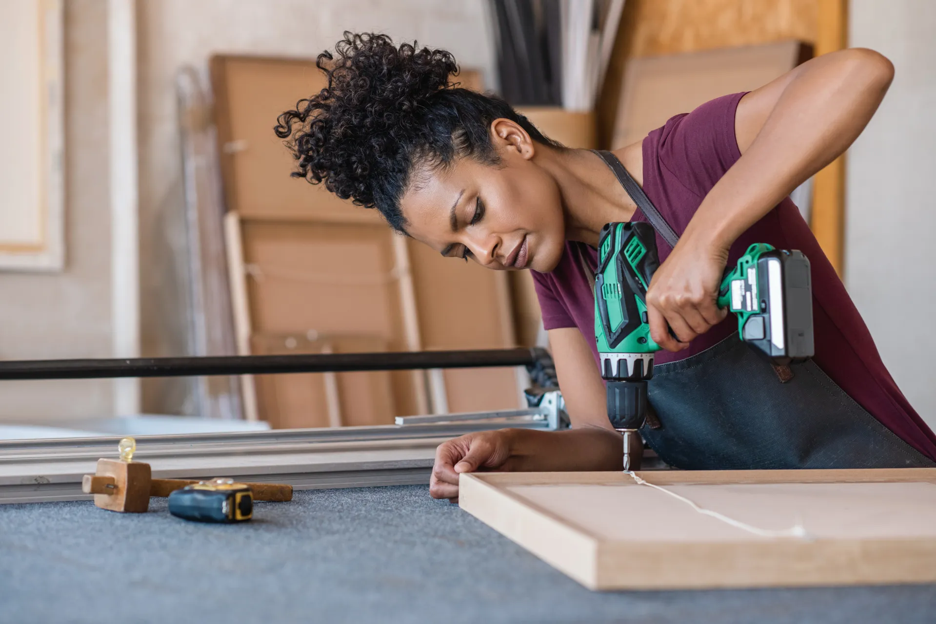 Lady using a drill