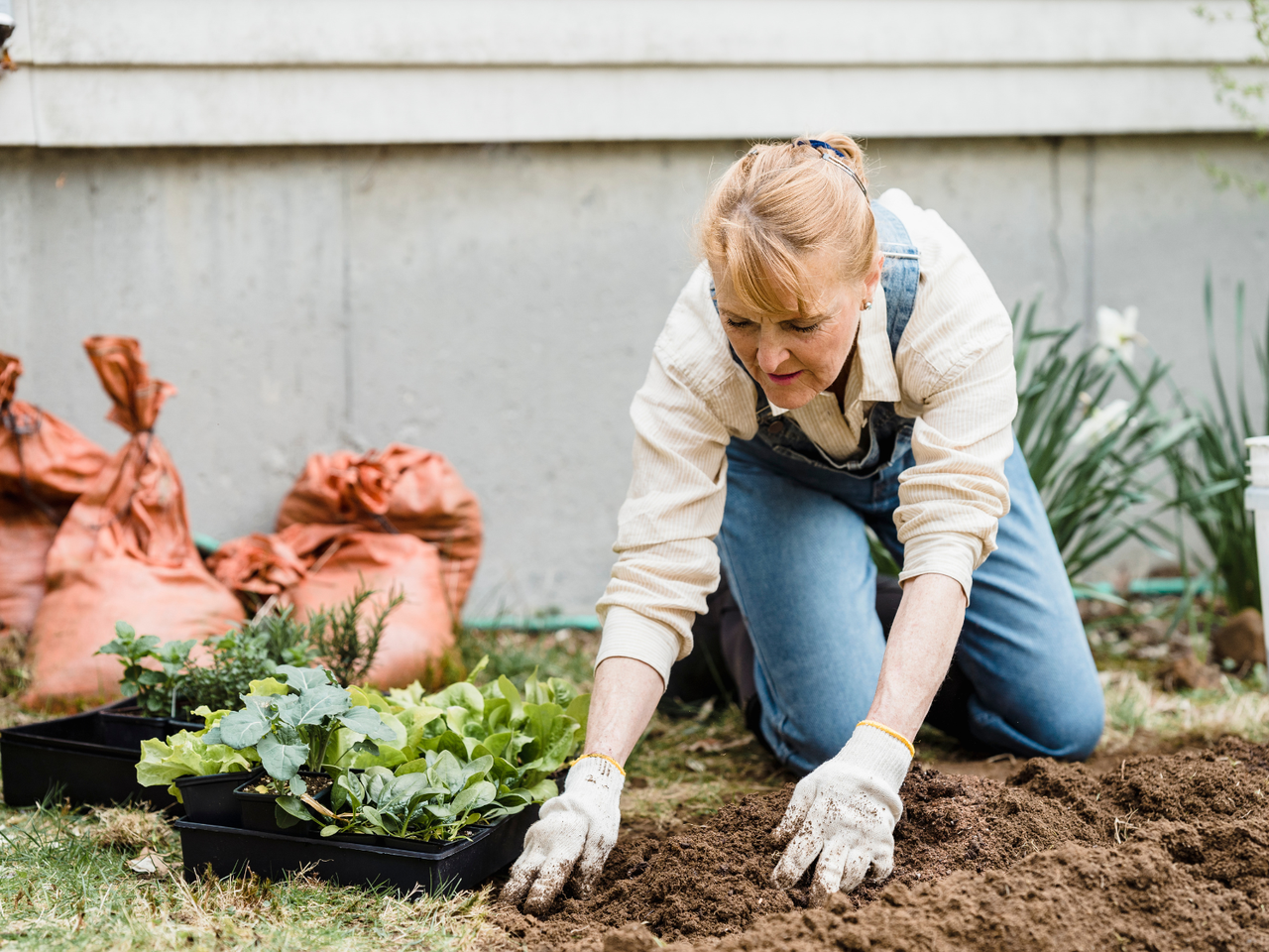 woman getting ready to plant