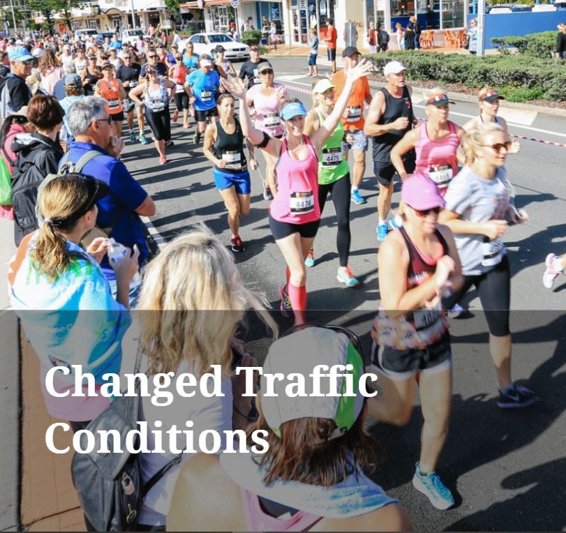 People running on the road for the marathon.