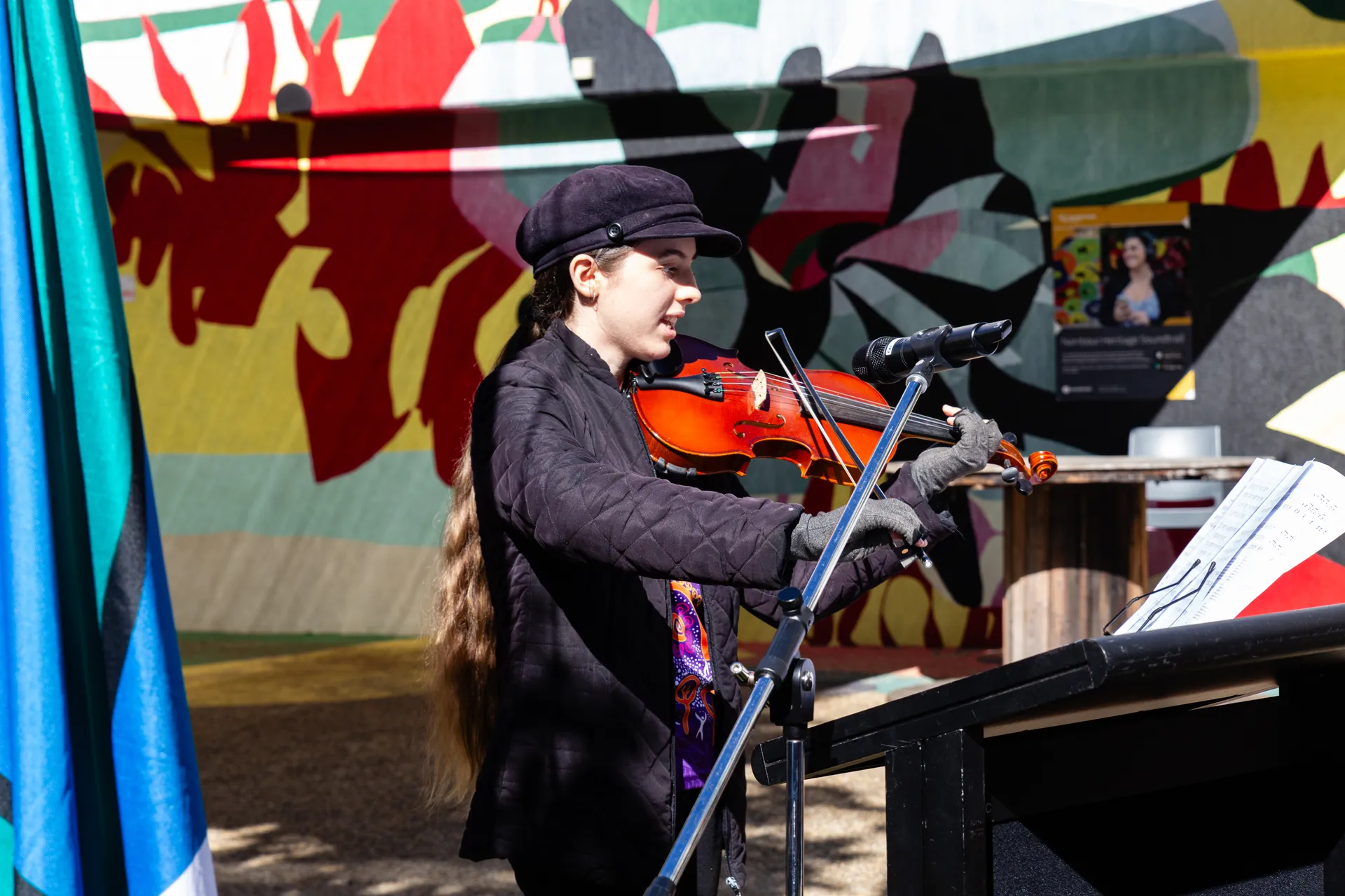 Young First Nations musician on her violin.
