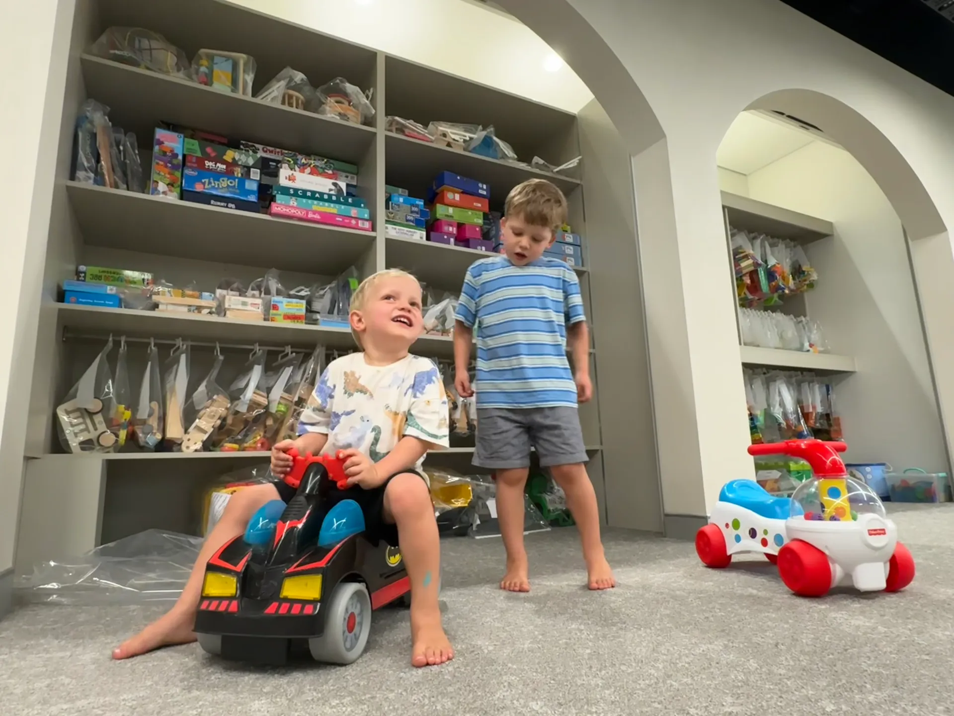 Mats and Kai try out the toy library at Library+ Caloundra.