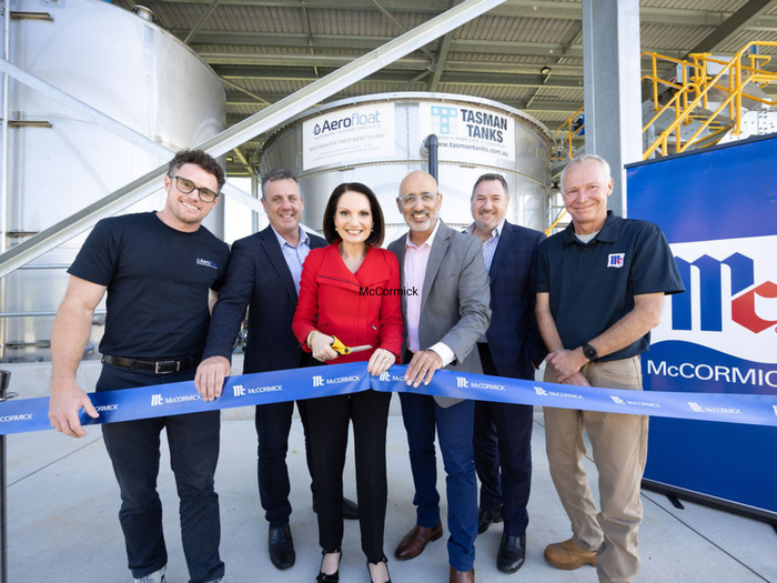 L to R Michael Anderson GM of Aerofloat, Marty Hunt MP, Mayor Natoli, Paris Golden MD of McCormick Australia, Minister Andrew Powell cutting the ribbon at McCormick's new trade waste facility. 