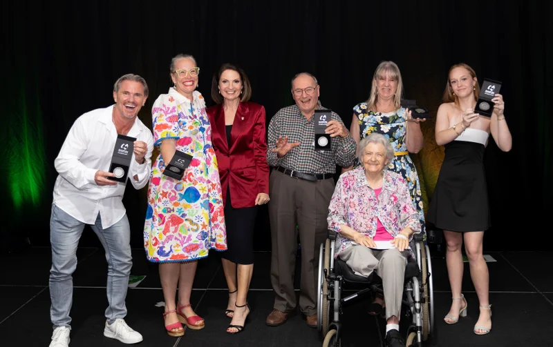 Award recipients celebrate with the Sunshine Coast Mayor. 