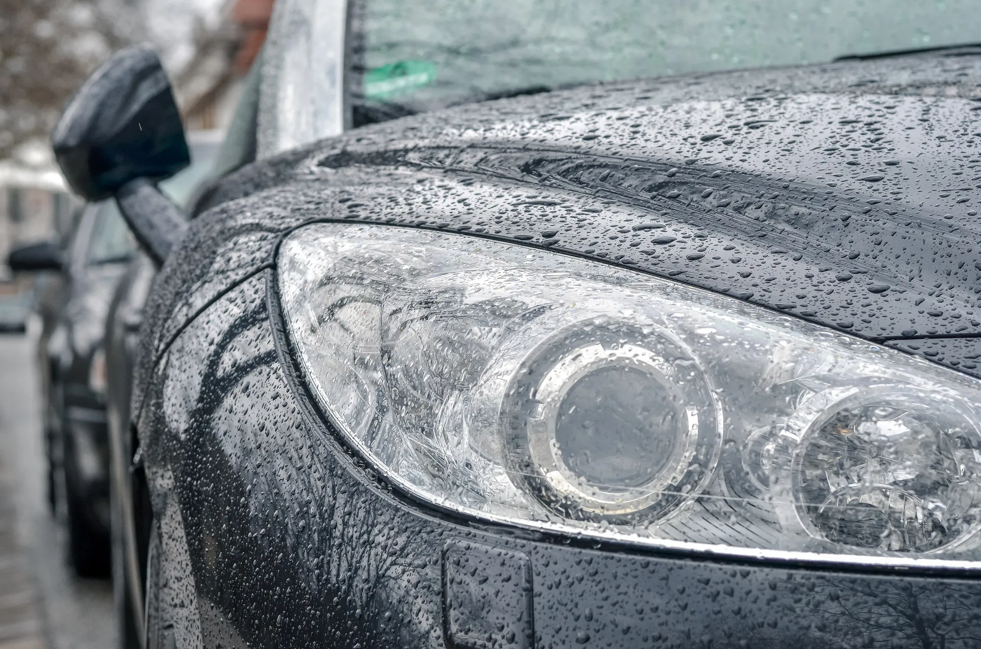 car headlights on a wet car