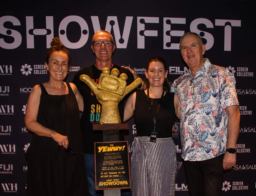Screen Summit 2025 - Four people standing together and holding a trophy with a hand holding a 'tv' - Lisa Fitzpatrick, Dan Munday, Louise Hyse, David Edgar
