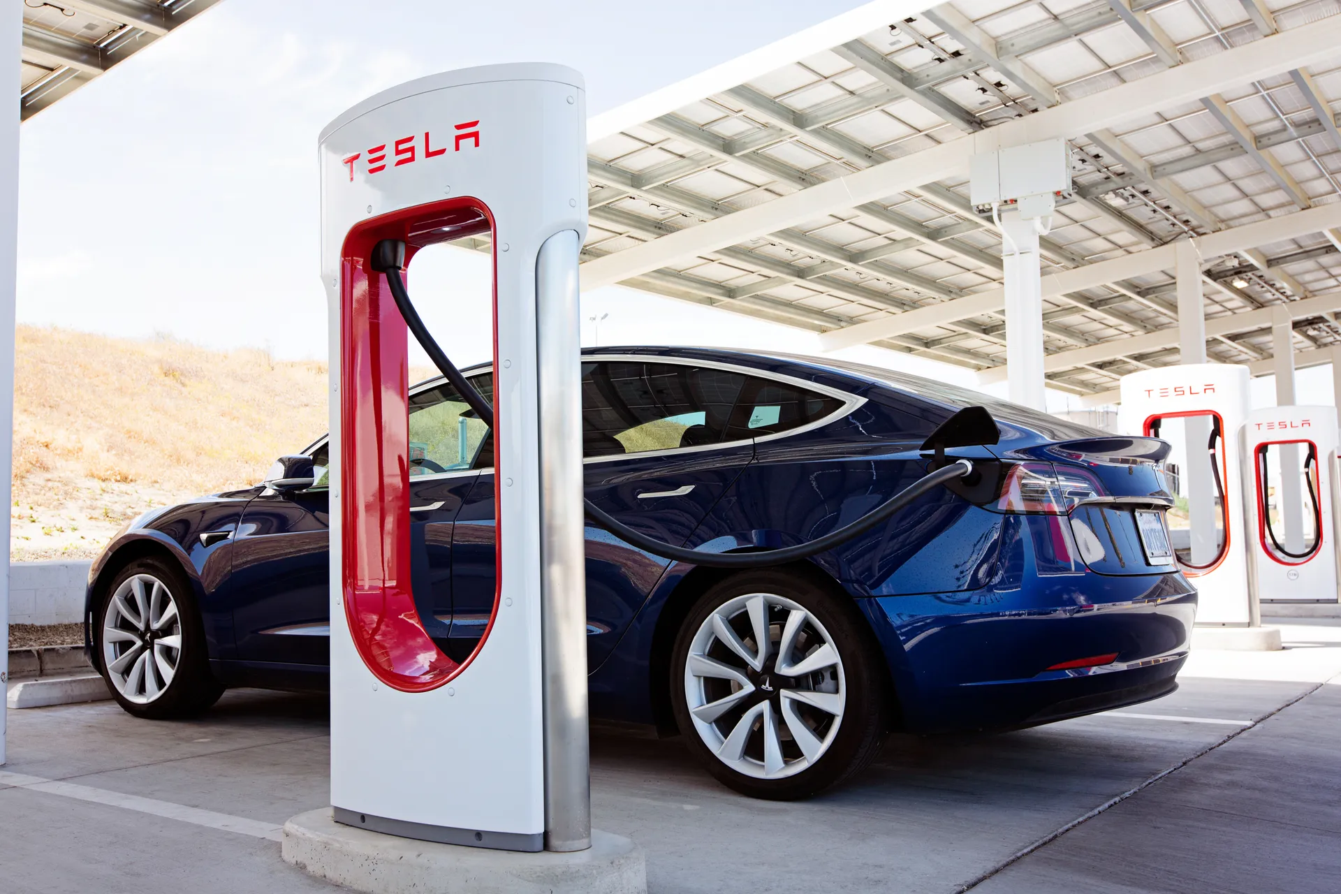 Tesla Model 3 at a charging station