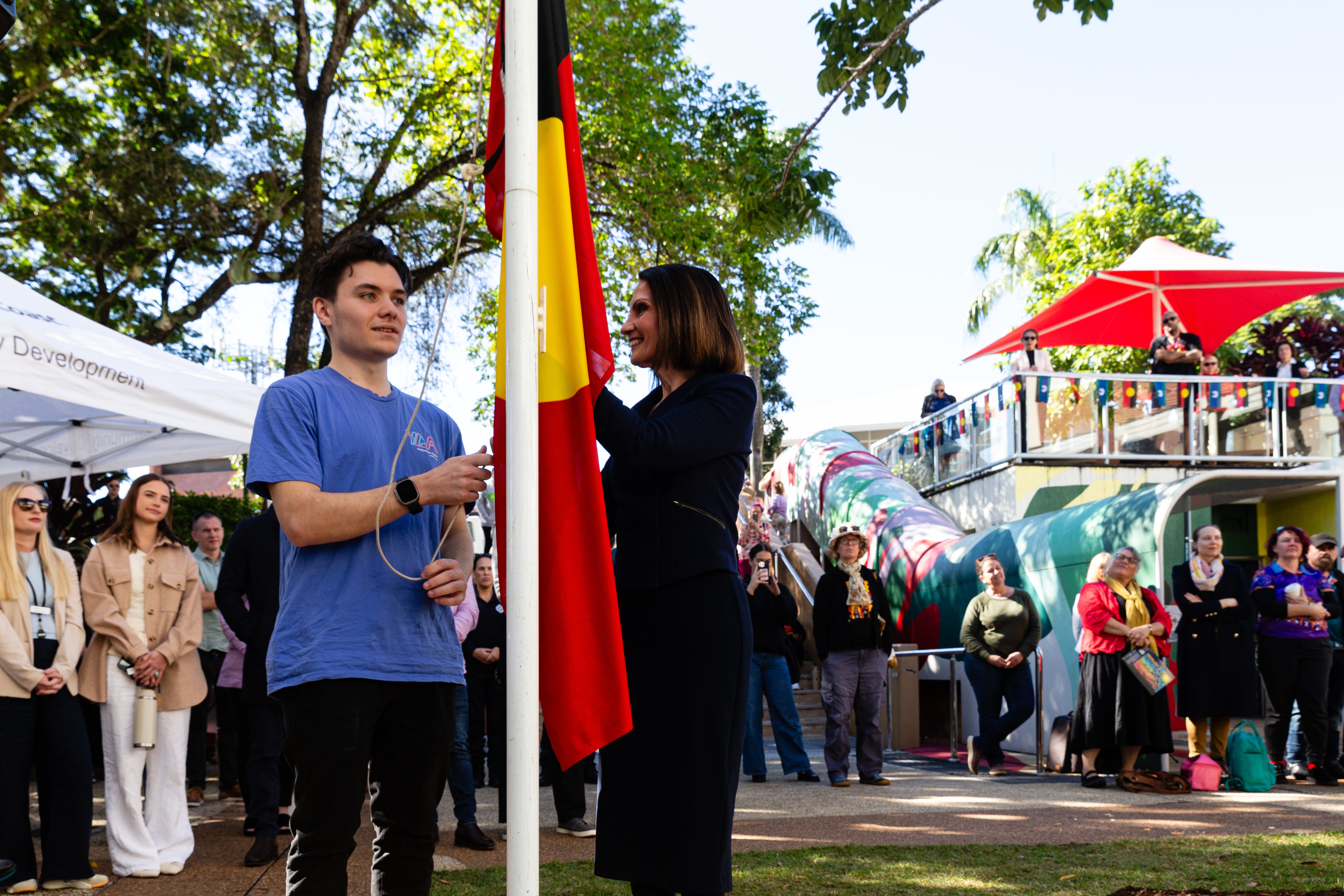 Raising the Aboriginal flag. 