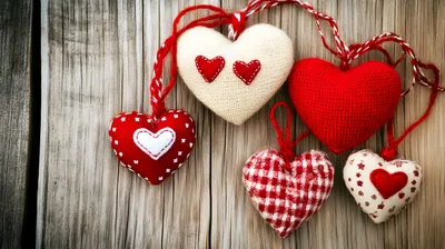 fabric hearts against a wooden panel