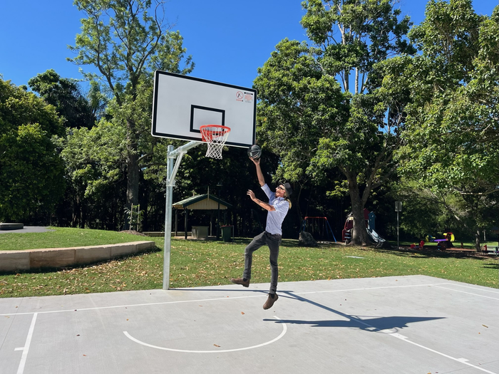 1600x1200 feature photo of man shooting basketball at new half court at Mapleton Lilyponds Park