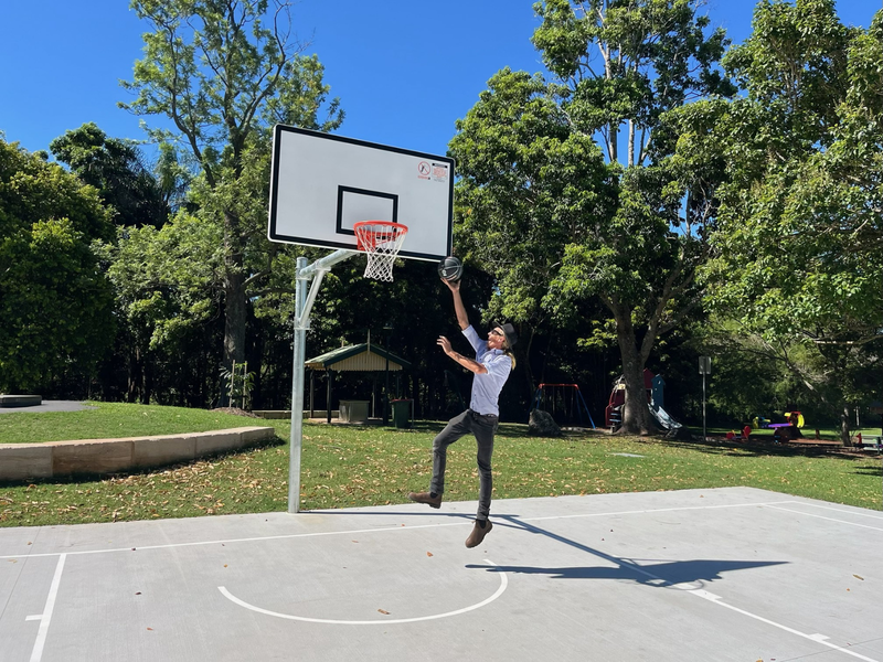 1600x1200 feature photo of man shooting basketball at new half court at Mapleton Lilyponds Park