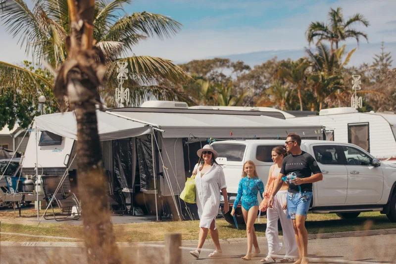 Family walking through Cotton Tree Beach Holiday Park