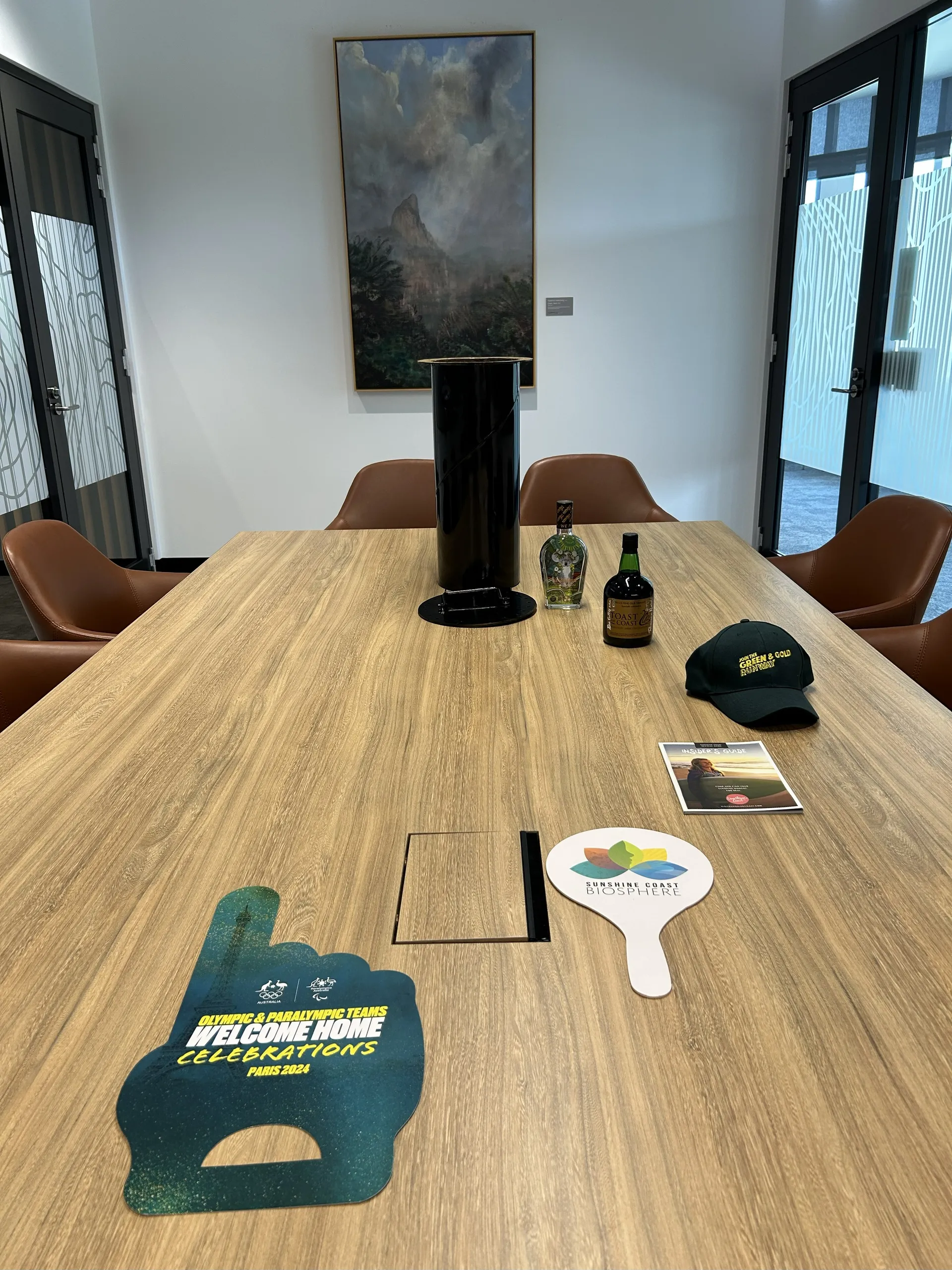 Paris 2024 hand waver, Biosphere hand waver, Visit Sunshine Coast Insider’s Guide booklet, Green and Gold Runway cap, a bottle of Tyrell’s Toast to the Coast 2000 Fine Old Tawny Port and Beachtree Gin.