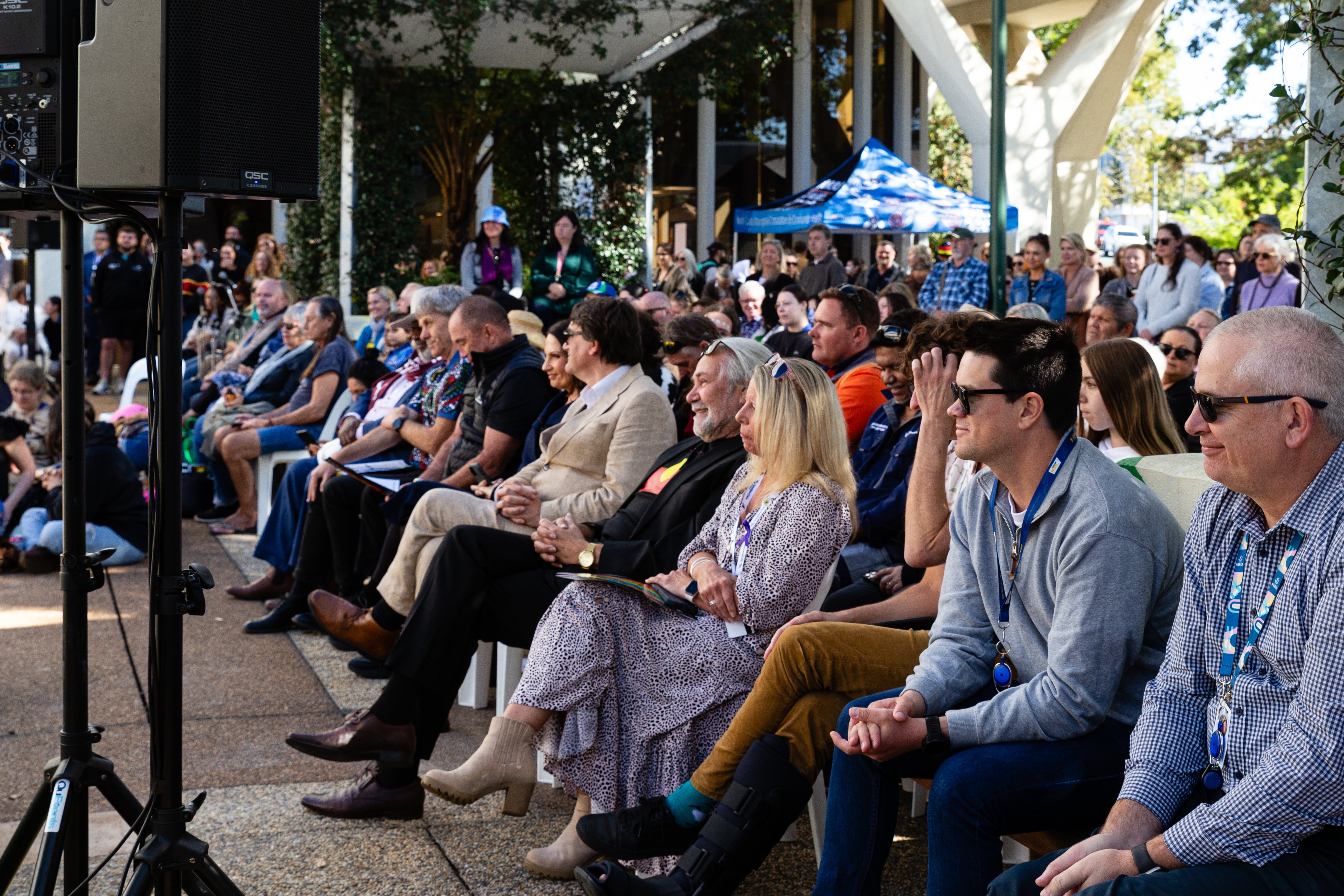 Crowd watching the Flag Raising and Youth Showcase. 