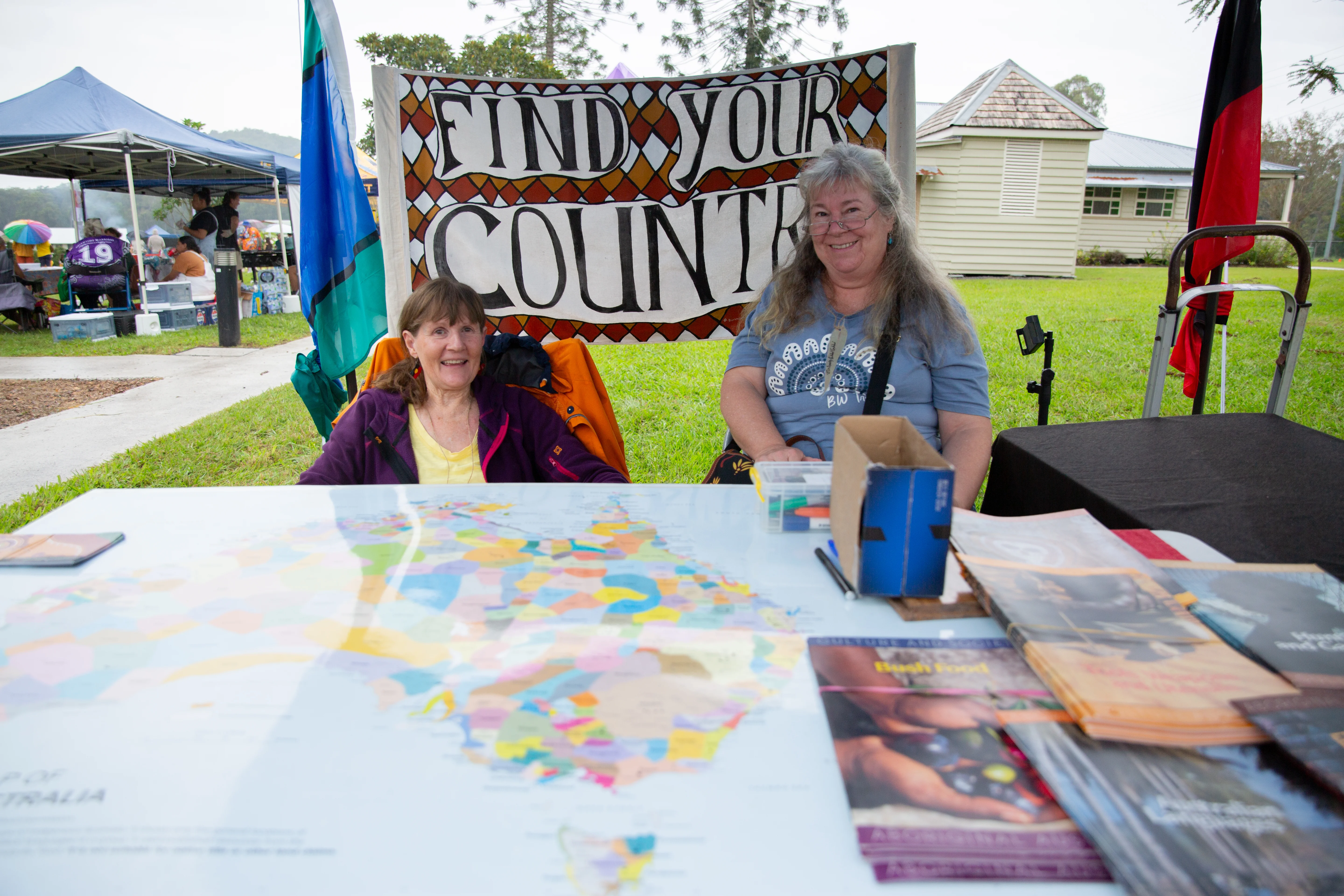 two ladies at the 2024 fun day 'Find your country' stall