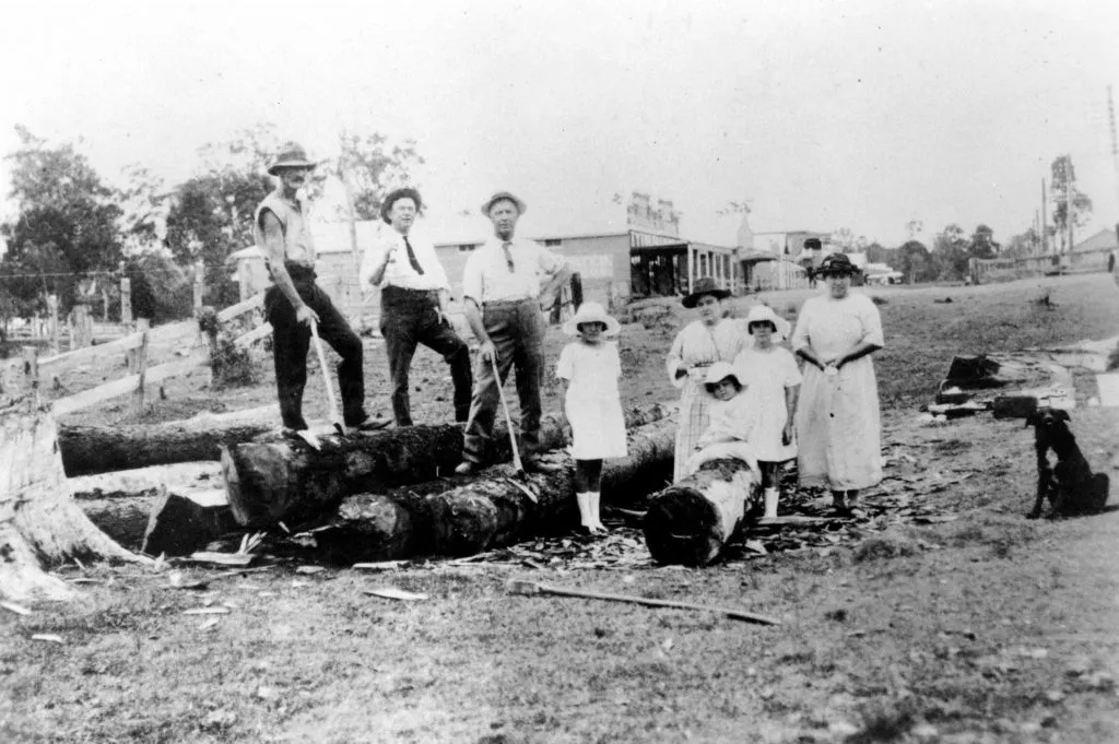 Preparing stumps in Cribb Street for the construction of the Landsborough School of Arts and Soldiers Memorial Hall, Landsborough ca 1922.
Pictured include: Businessman and Shire Councillor John Tytherleigh (standing third from right). Tytherleigh donated the land for the hall.
