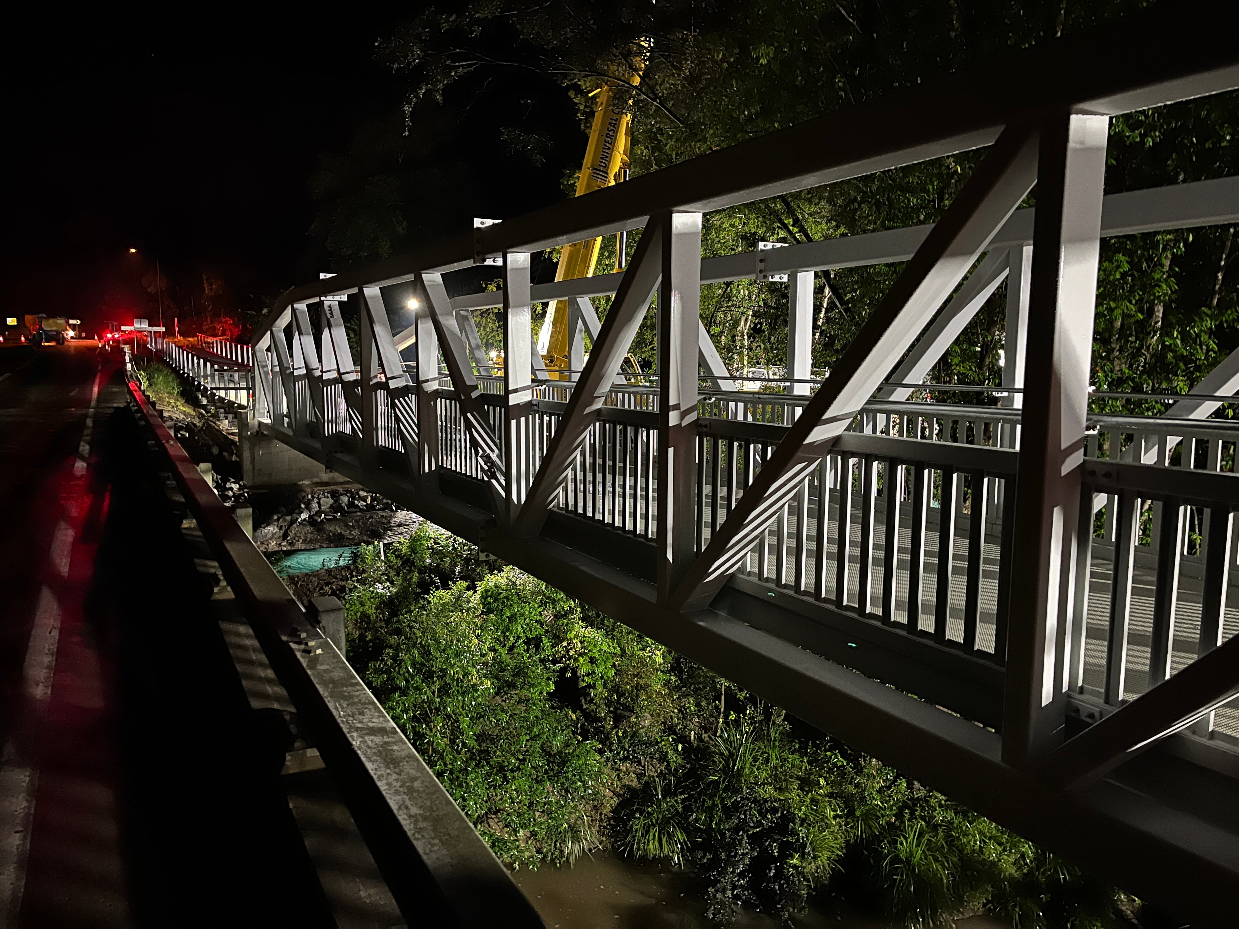 Bridge being craned into place. 
