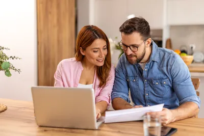 Couple working at a table