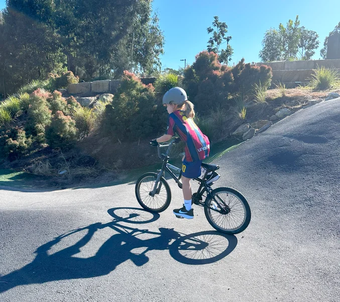 Rider on the pump track at Sugar Bag Road, Sunshine Coast
