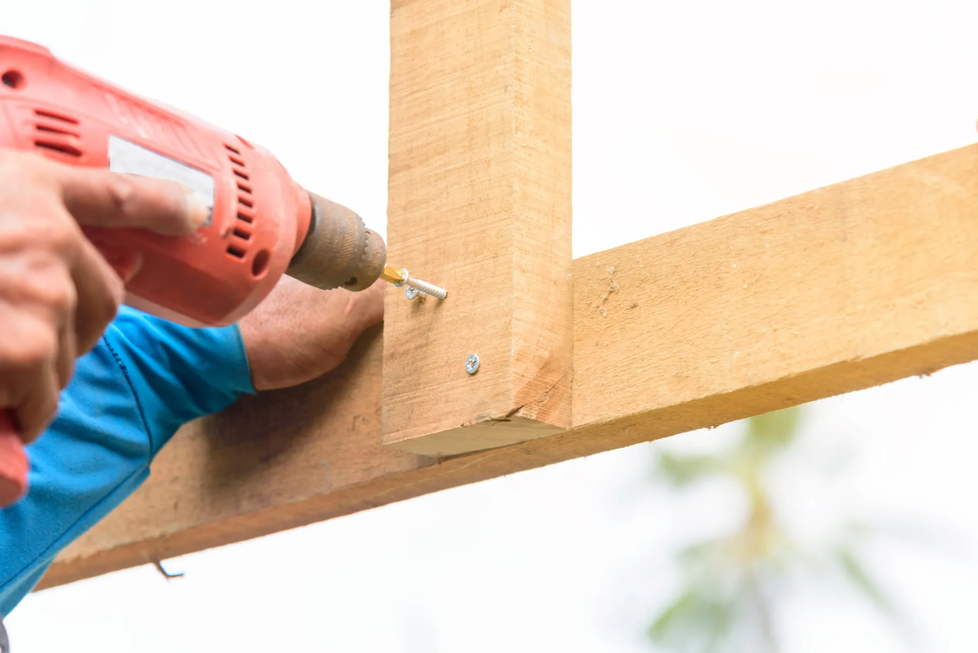 Drilling into a wooden frame