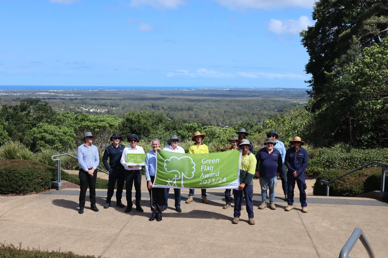 Sunshine Coast Council Parks and Gardens Team celebrate with Councillor Ted Hungerford - view looking towards the coast. 
