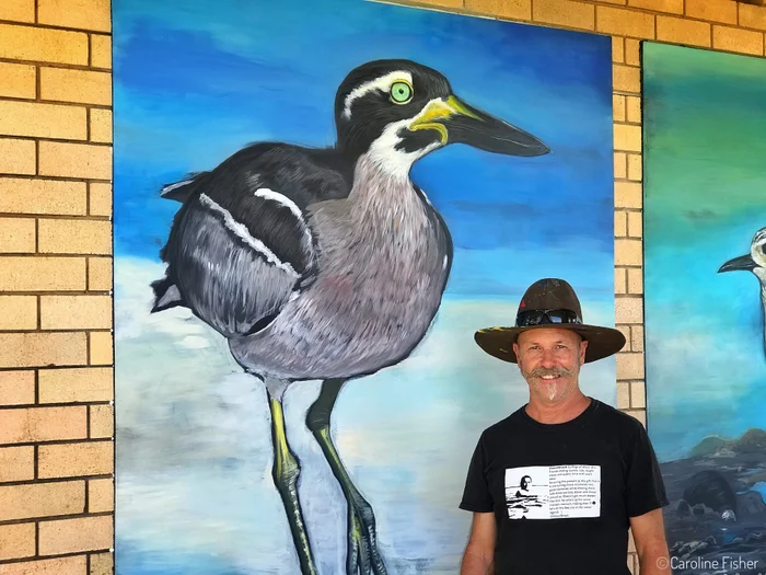 Caloundra-artist-Steven-Bordonaro-with-one-of-the-shorebirds-in-the-Golden-Beach-mural.jpg