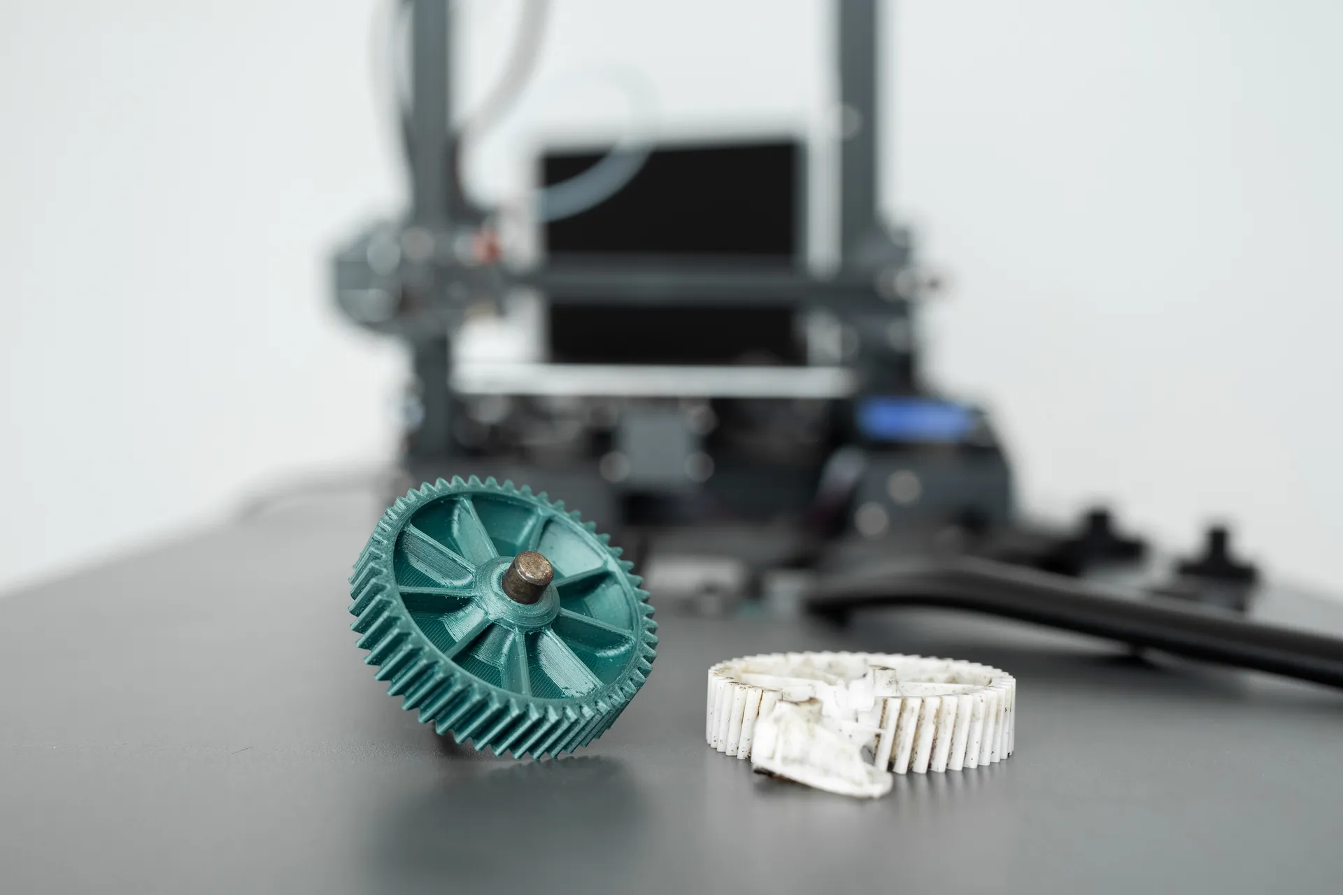broken cog and replacement 3D printed cog