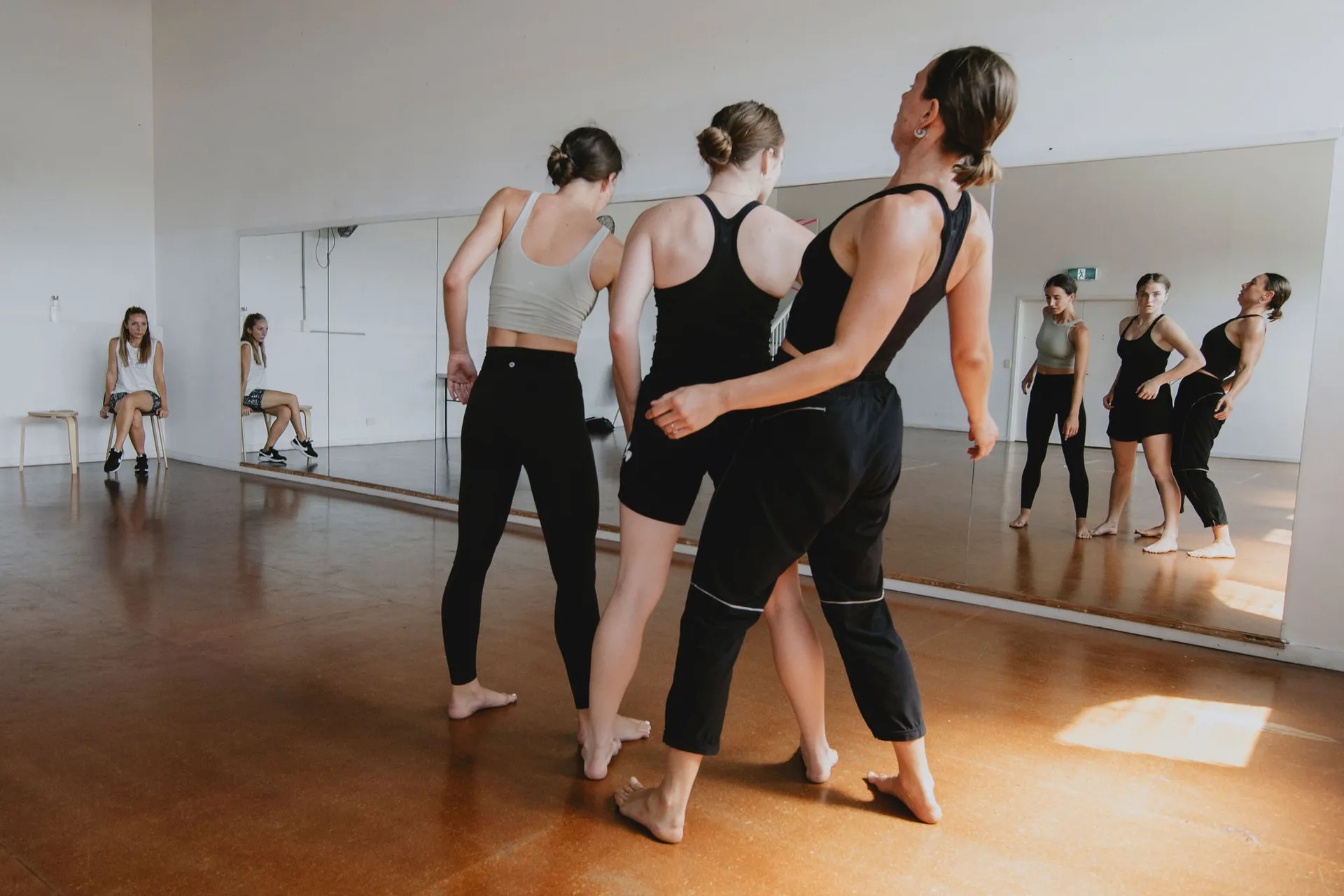 Image shows dancers in a studio