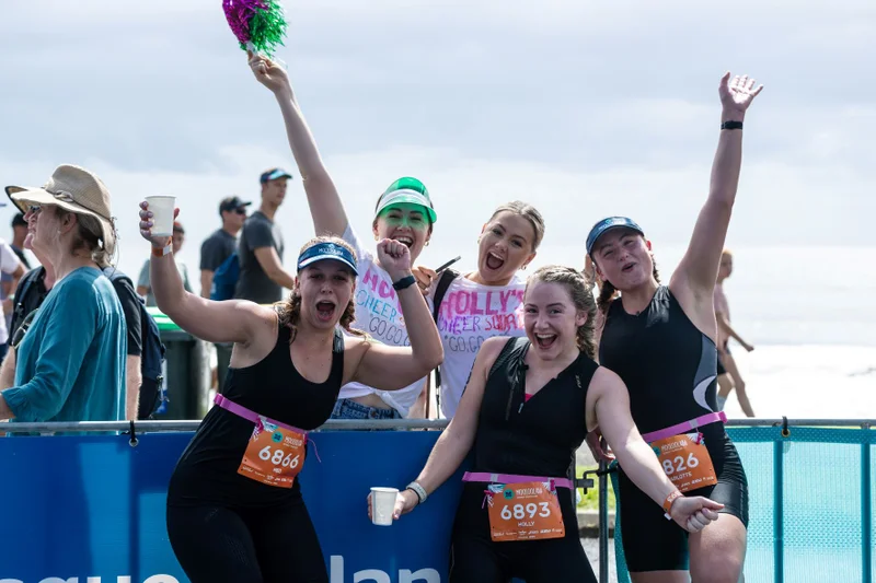 All-smiles-on-the-finish-line-at-the-Mooloolaba-Triathlon-Photo-Korupt-Vision.jpg