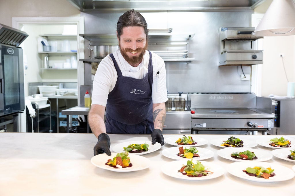 Chef plating food