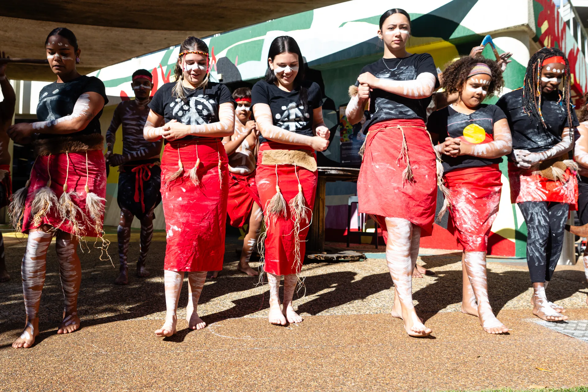 First Nations dancers in traditional wear.