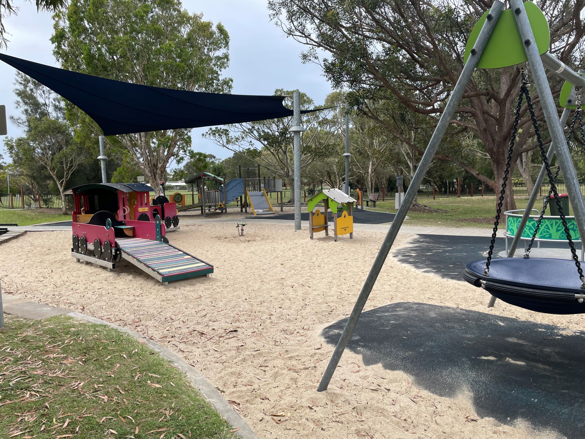 Park with sand, train, slides