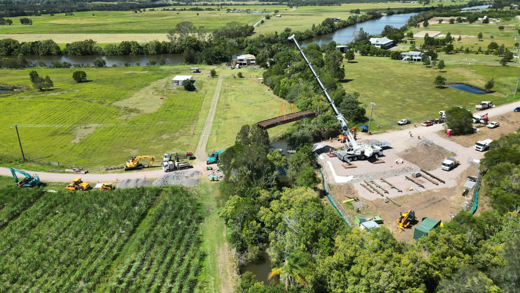 Aerial view of the bridge being put into place