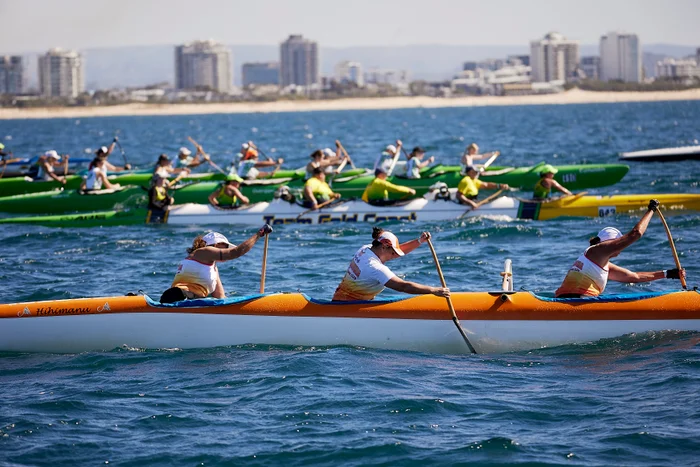 Three outrigger teams racing - Mooloolaba Spit