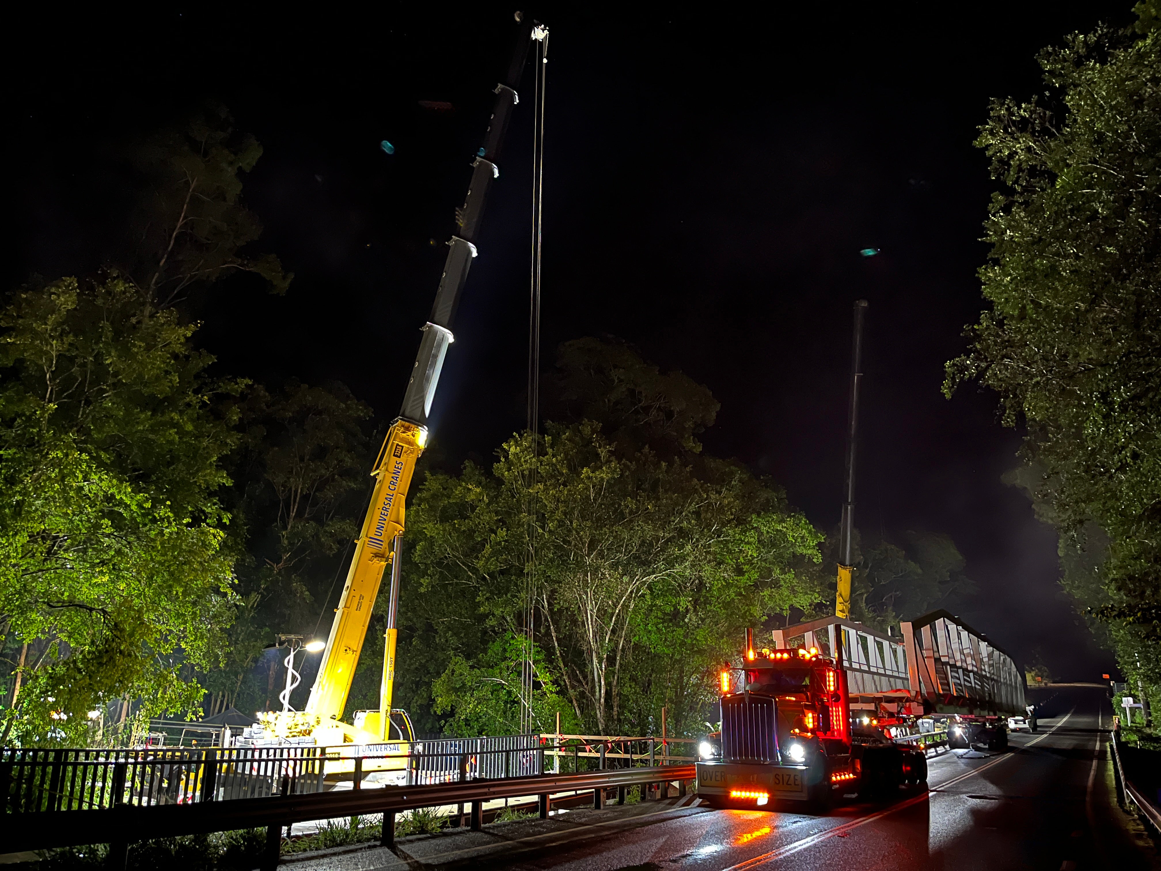 Crane installing the new Seib Road pedestrian bridge. 