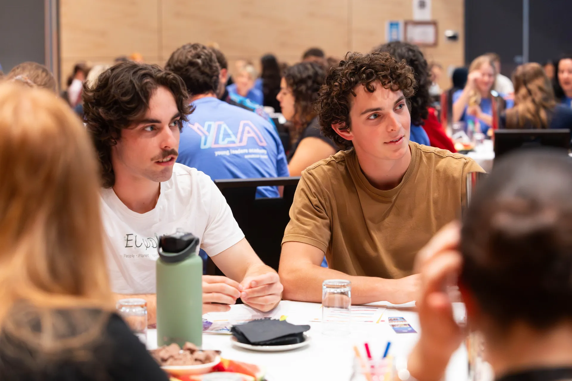 Young people sharing ideas at youth event