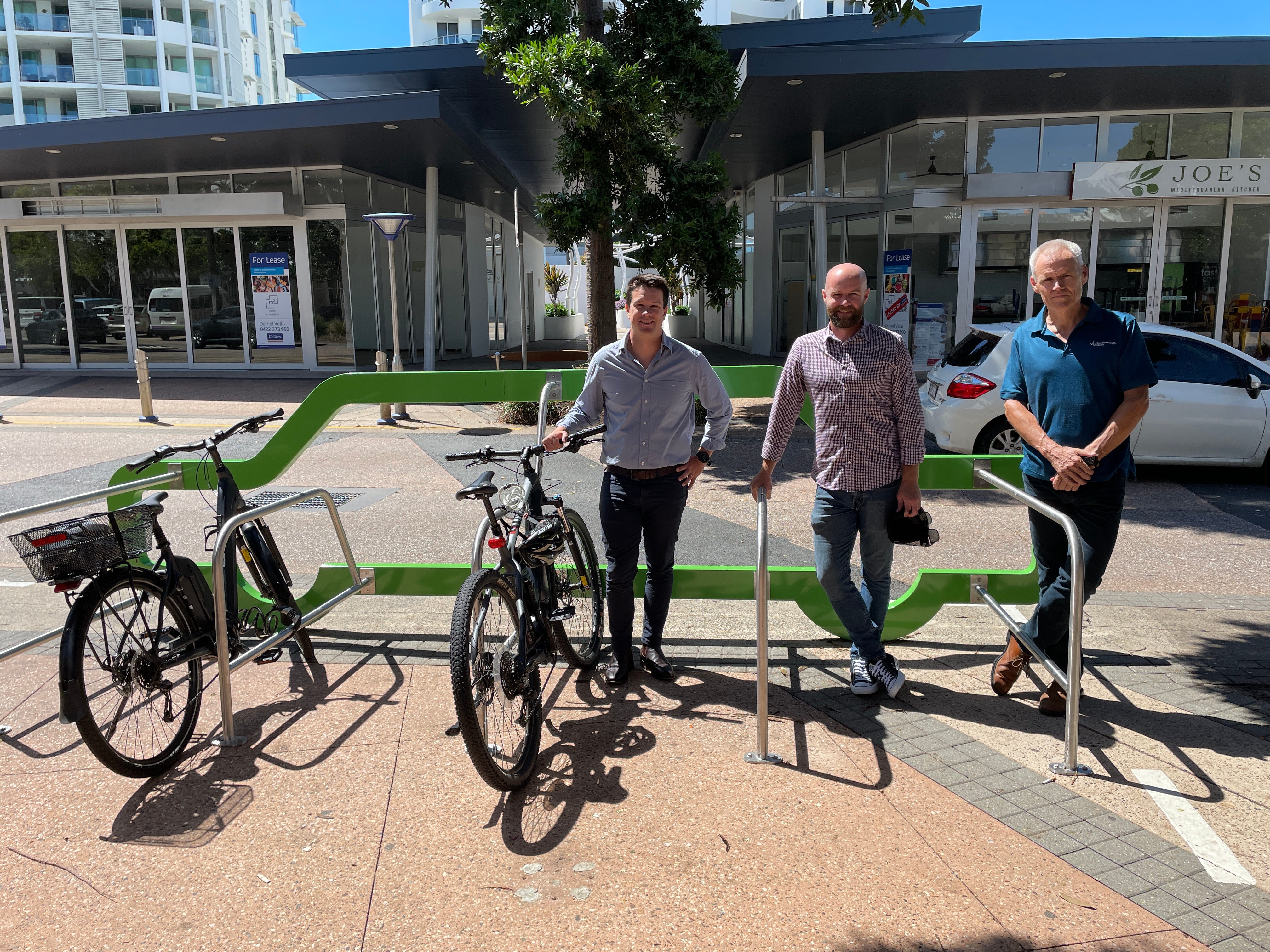 Cr Taylor Bunnag and project team inspecting the new BikeHub. 