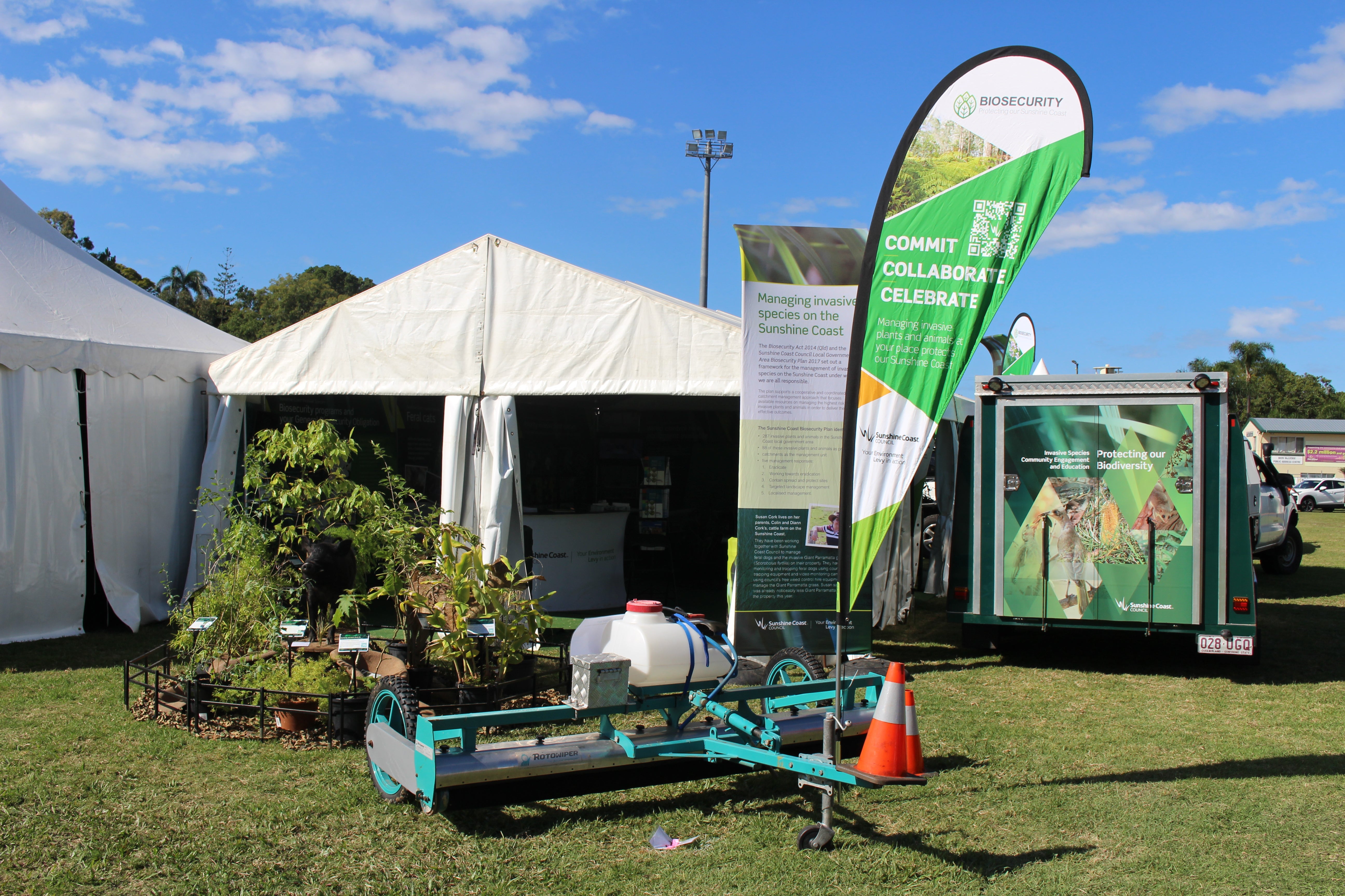 A picture of a marquee and signage to denote the Sunshine Coast Council stall