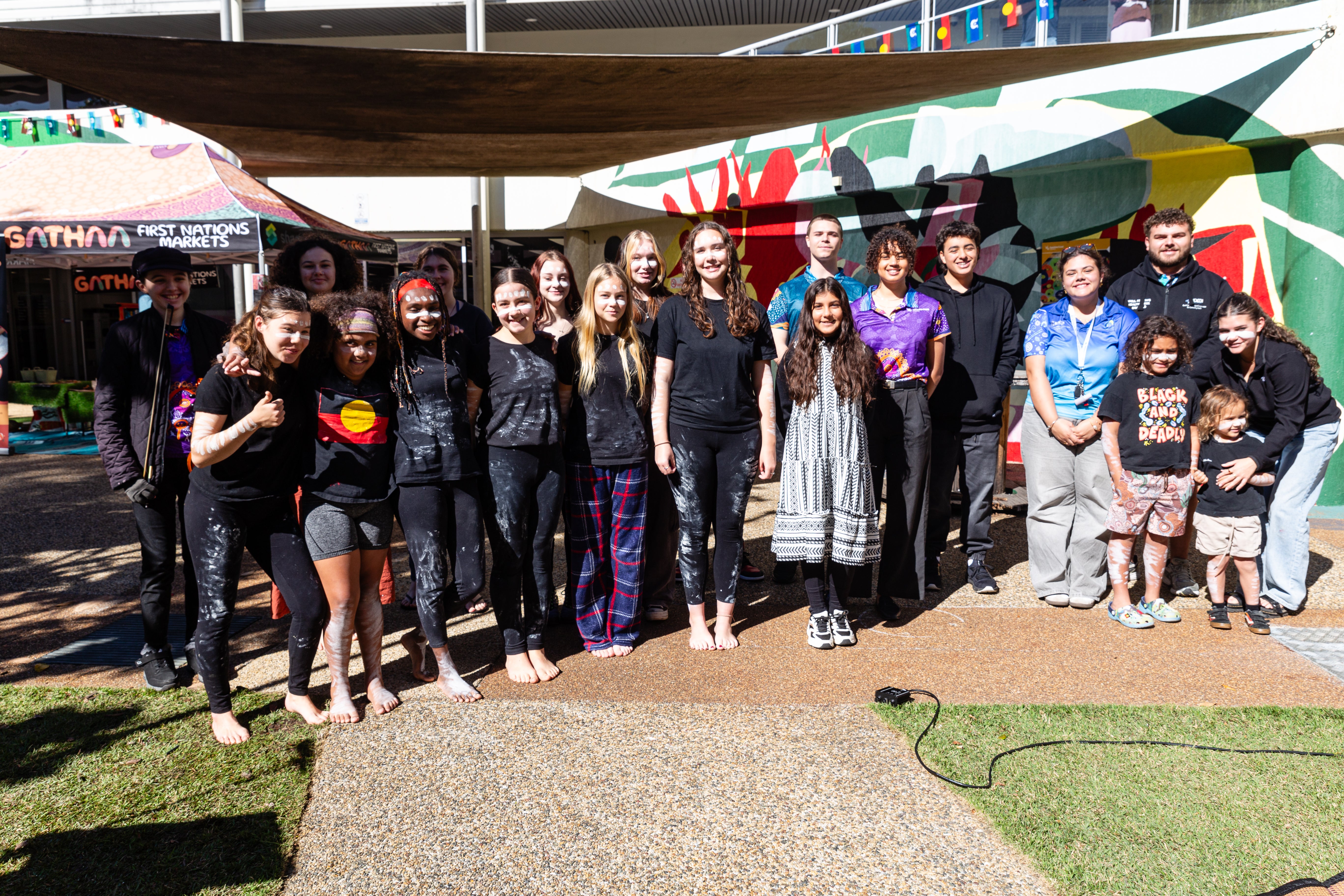 The youth involved in making the event happen gather for a group photo. 