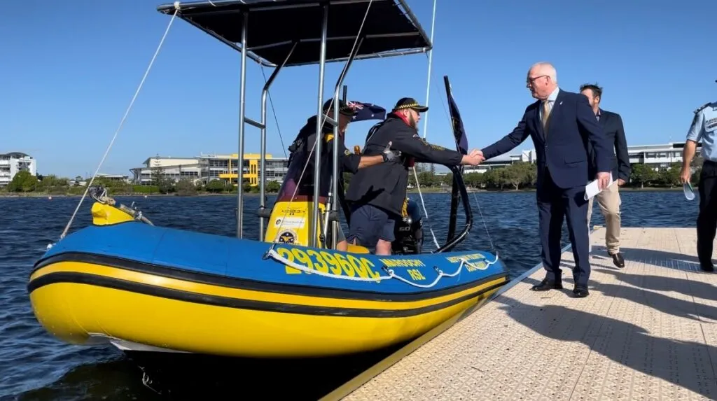 Coast-Guard-shaking-Mayors-hand-1-1024x573.jpg