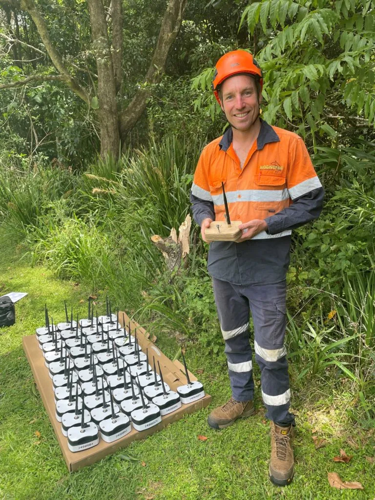Biodiverse Environmental Director Liam Pratt and the hardwood nest boxes ready to be installed.