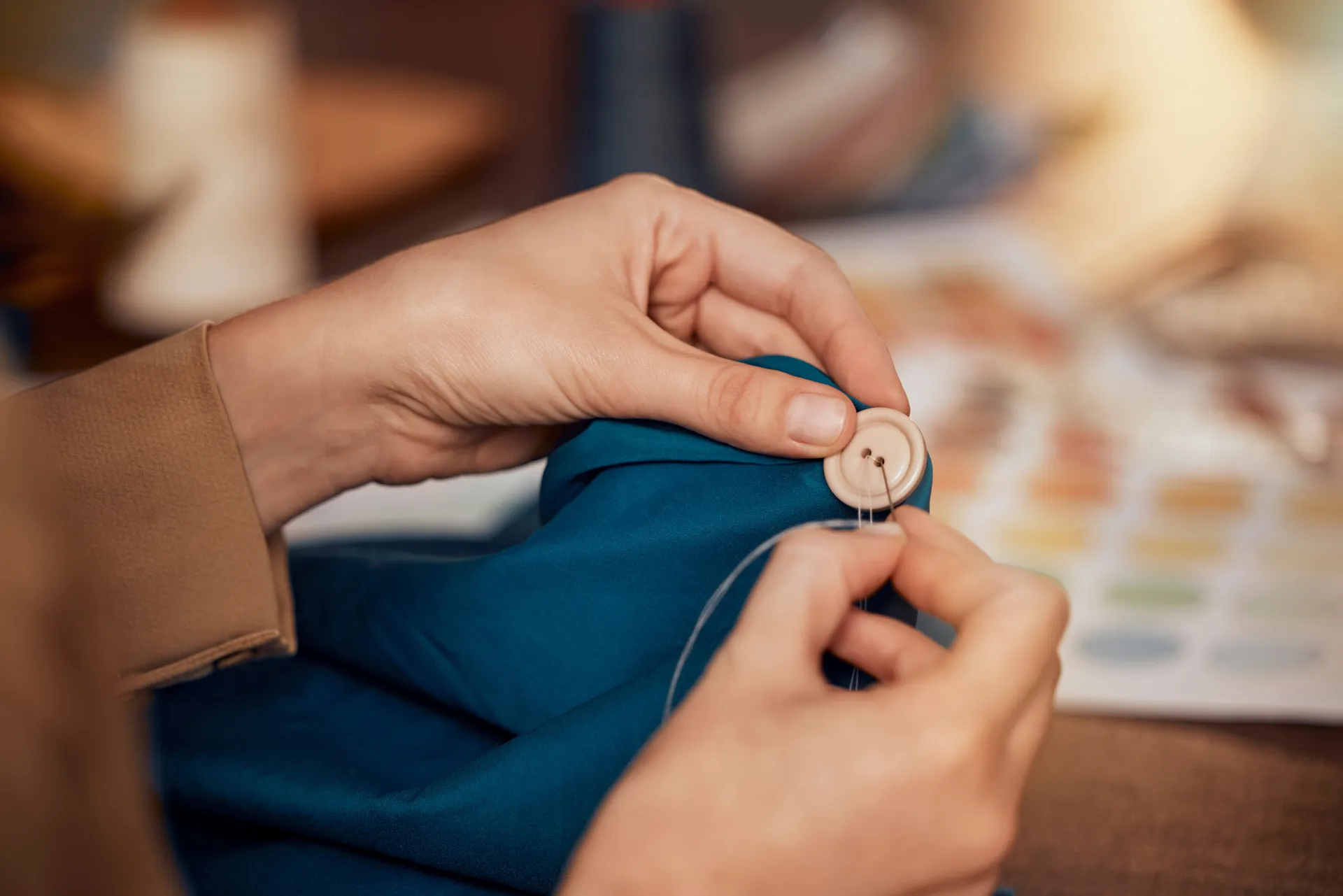 sewing on a button