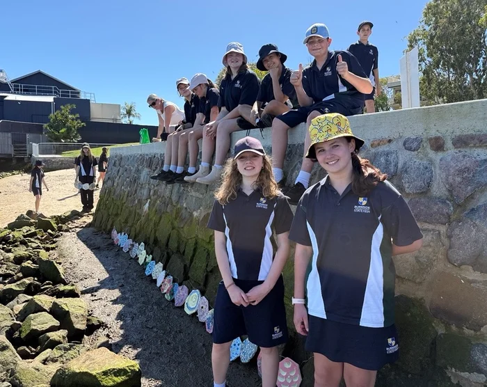 Burnside State High School students at the installation of the Living Seawall, Penny Lane, Mooloolaba