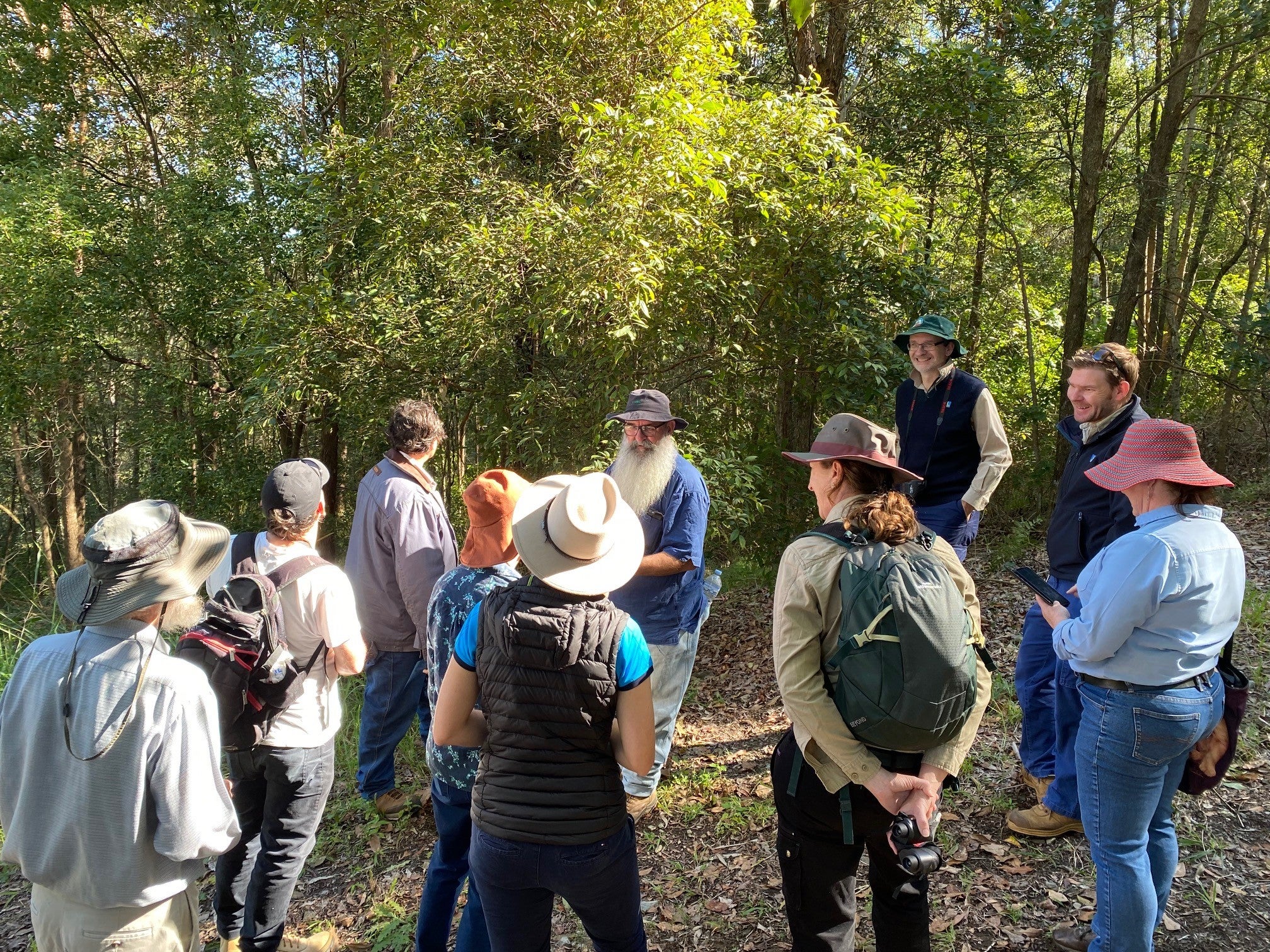 A crowd gathered to listen at a Land for Wildlife field day.