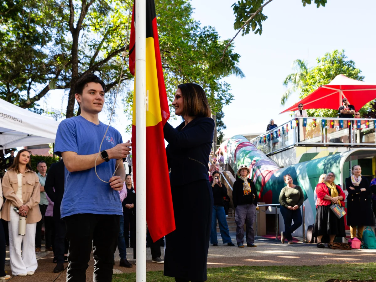Community gathers for flag raising and cultural celebrations